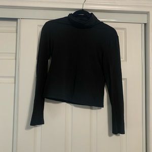 Black turtle neck.